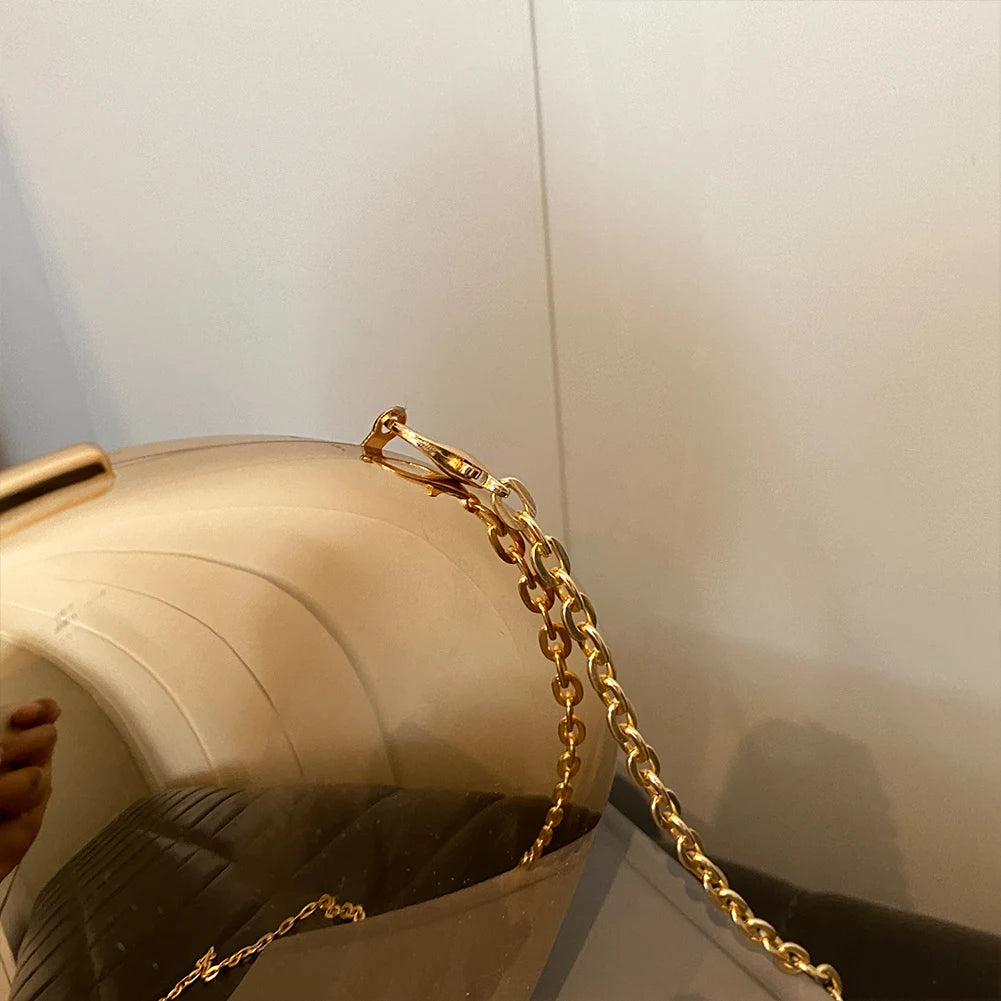 2024 Acrylic Shining Shoulder Bag Metal Oval Shaped Women Crossbody Bags Luxury Designer Handbag Novelty Clutch Purse with Chain